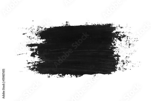 Black oil grungy brush strokes painted on white background. photo