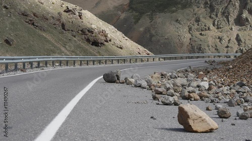 Rockfall on a mountain road photo