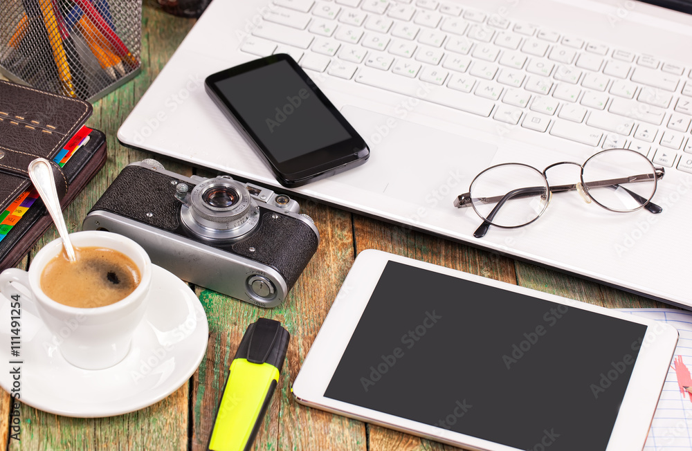 Business Objects office expanded in composition on a table Business Objects office expanded in composition on a table