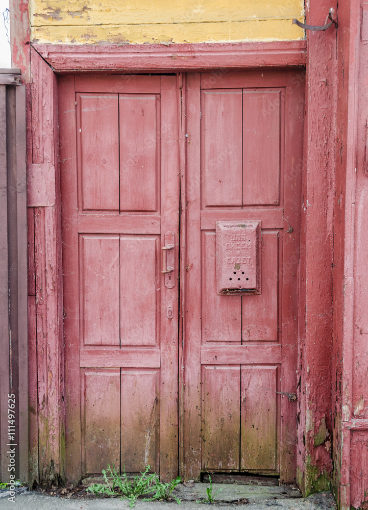 Antique door / old door / A weathered blue door / old wooden door / The Old Door with Cracked Paint Background / Door of an old abandoned building Antique door / old door / A weathered blue door / old wooden door / The Old Door with Cracked Paint Background / Door of an old abandoned building