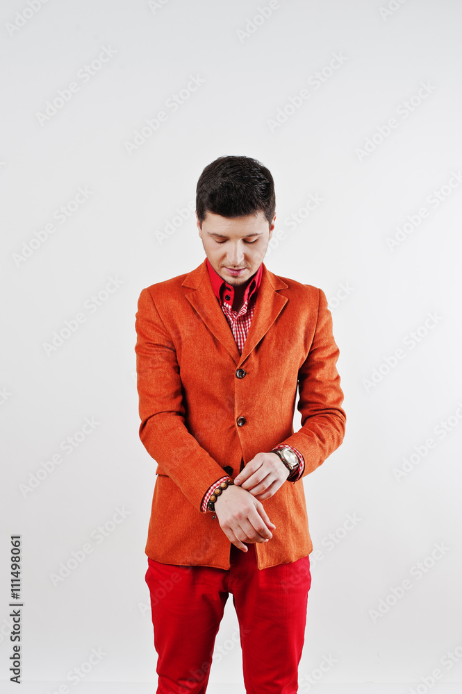 Premium Photo  Fashion young man in black suit and red pants