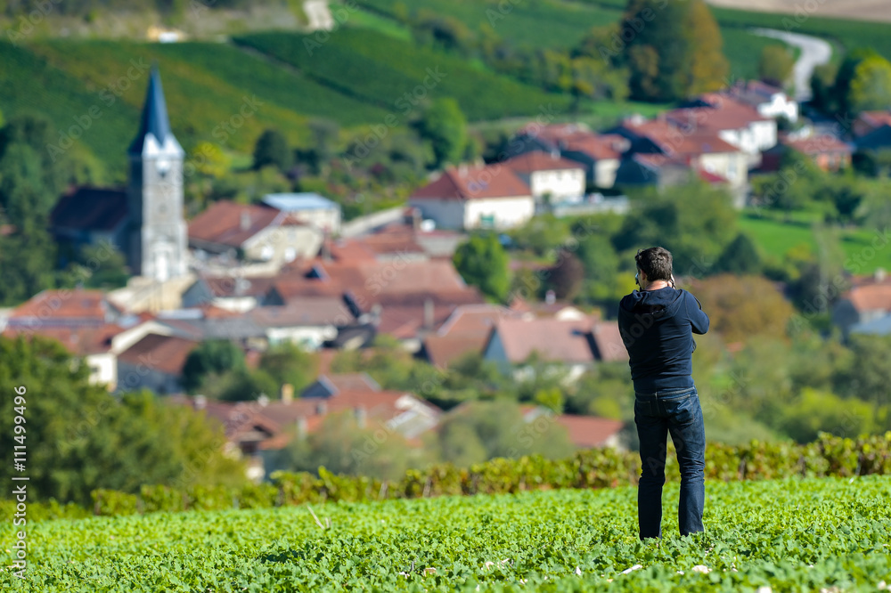 Photographer in action, in Champagne vineyards in the Cote des B