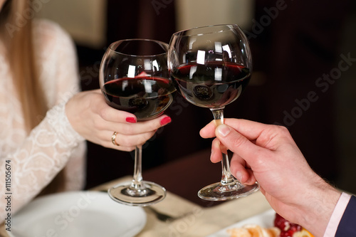 Couple toasting wineglasses