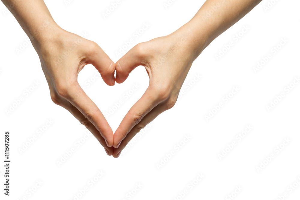 Obraz premium girl's hands serried in a heart shape on isolated background