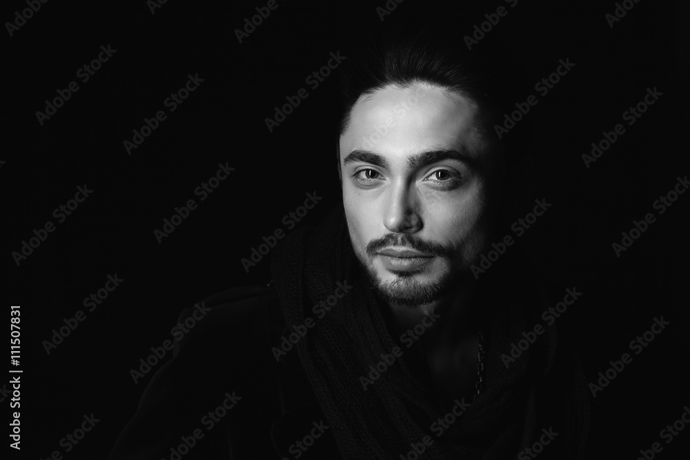 Portrait of beautiful sexy man in the studio. black and white. Portrait of beautiful sexy man in the studio. black and white.