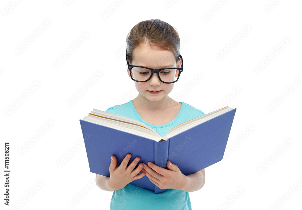 happy little girl in eyeglasses reading book happy little girl in eyeglasses reading book
