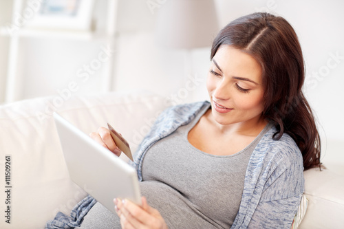 pregnant woman with tablet pc and credit card Free Download pregnant woman with tablet pc and credit card - GFXLoad