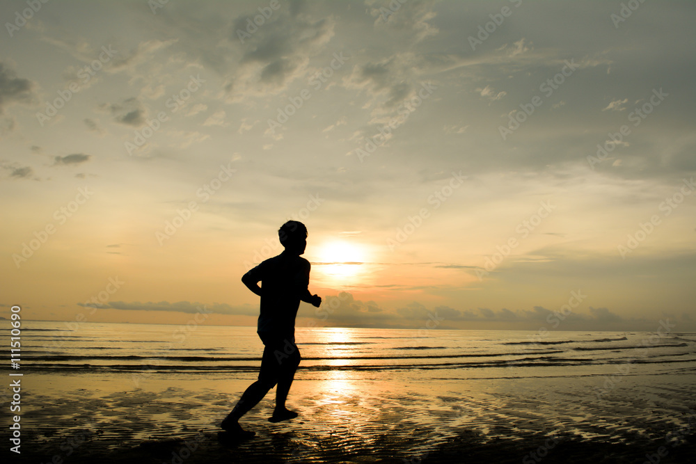 Silhouette Man Running Background sunset on the sea