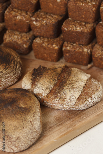 baked bread on wooden table background