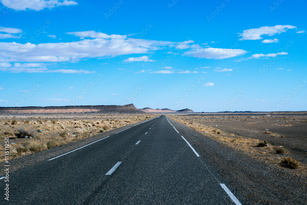 Endless road in Sahara Desert, Africa