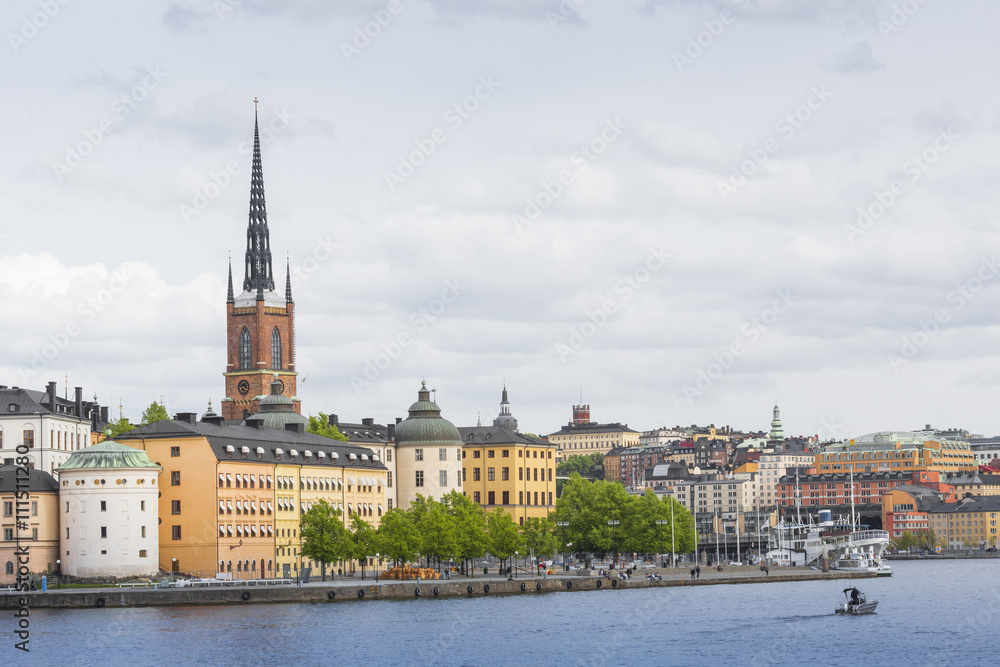 Scenic panorama of the Old Town (Gamla Stan) pier architecture in Stockholm, Sweden