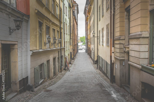 Fototapeta Naklejka Na Ścianę i Meble -  Narrow Street in Old Town (Gamla Stan) of Stockholm, Sweden