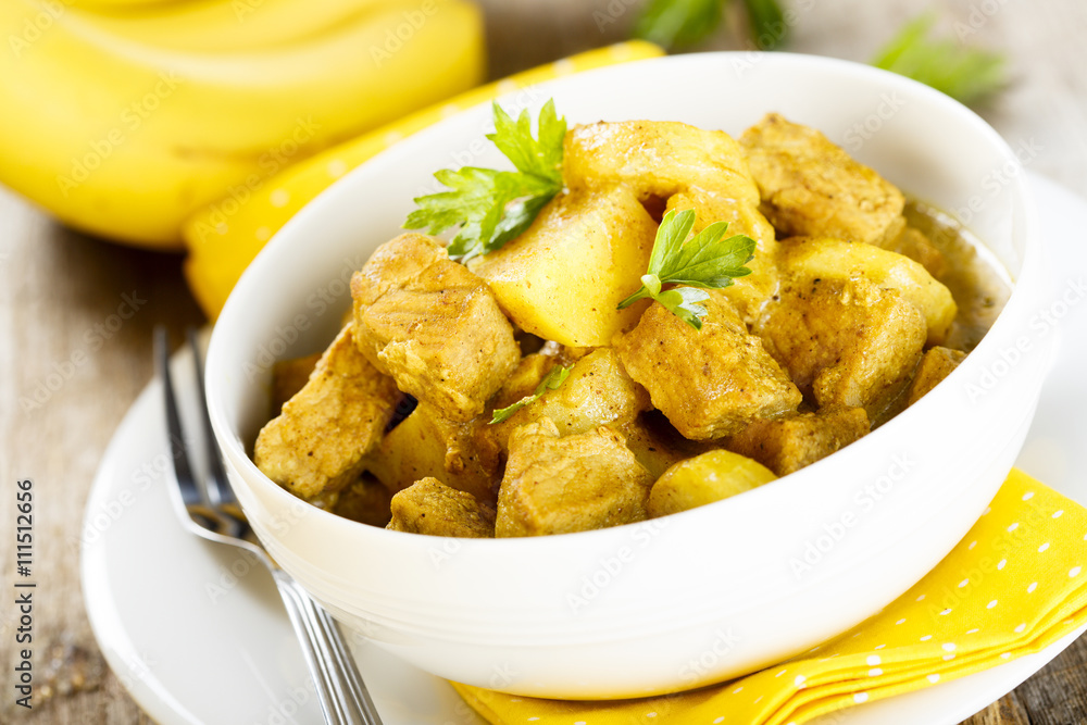 Meat curry with potatoes and banana Meat curry with potatoes and banana
