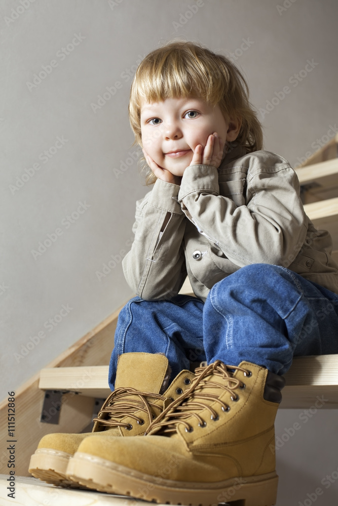 Big shoes to fill child's feet in large shoe Big shoes to fill child's feet in large shoe