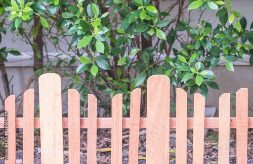 Closeup wooden fence in garden background