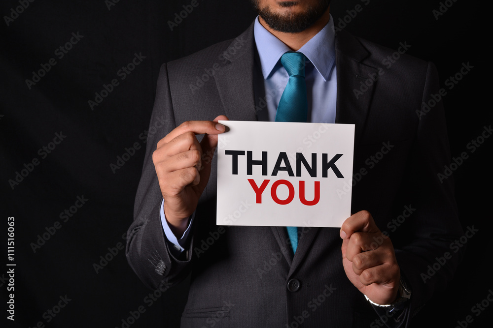 Obraz premium Professional Holding a Thank you Sign in hands