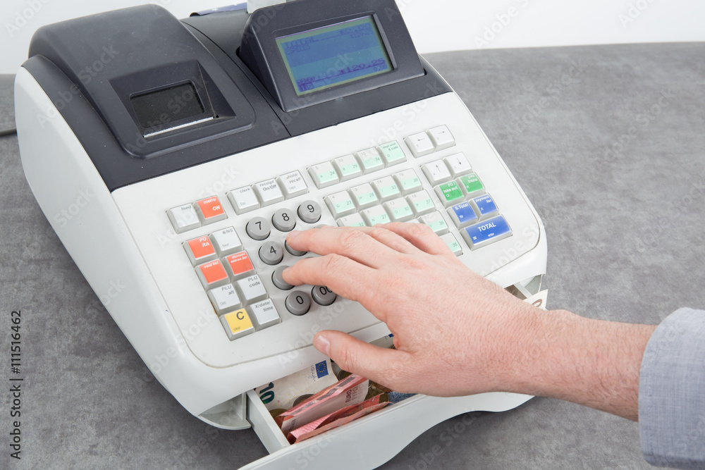 Hand open the cash register and giving change in euro Hand open the cash register and giving change in euro