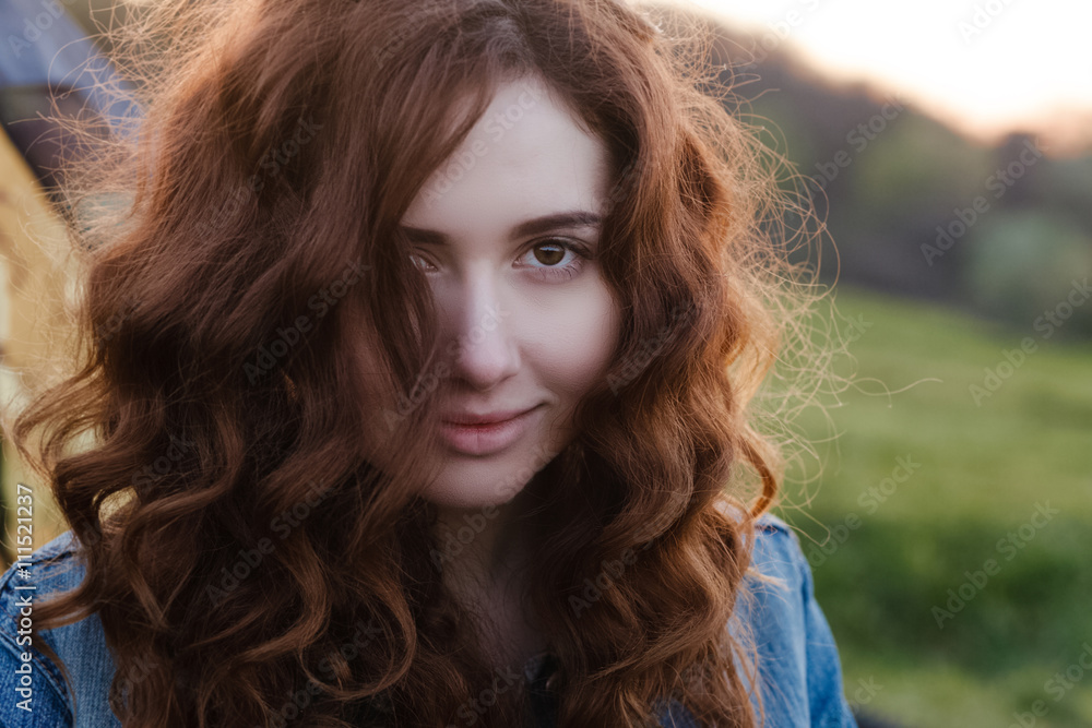 beautiful young girl on the street. nature, sunset beautiful young girl on the street. nature, sunset