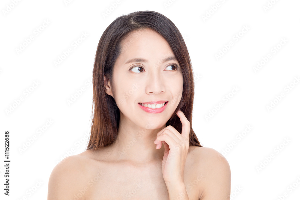 Asian woman with perfect skin and looking away Asian woman with perfect skin and looking away