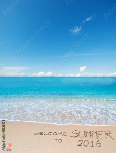 welcome to summer 2016 written on a tropical beach