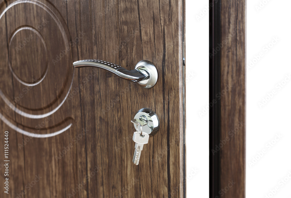 Open brown wooden door handle with lock. Open brown wooden door handle with lock.