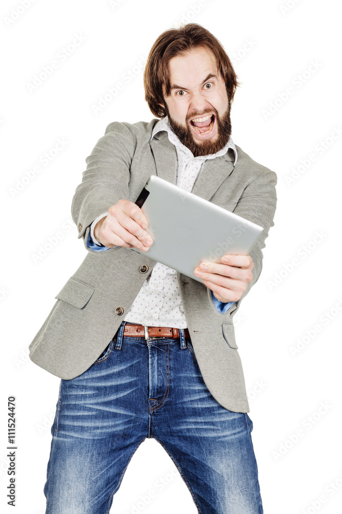 Businessman playing at a digital tablet, isolated in white. Businessman playing at a digital tablet, isolated in white.