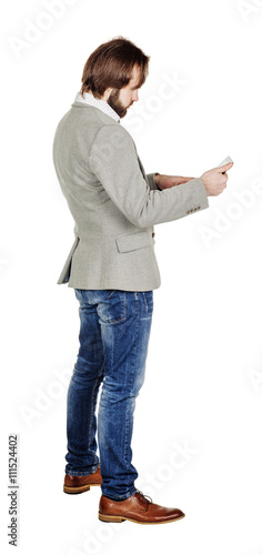 bearded young business man using digital tablet. portrait isolat