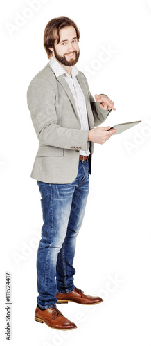 bearded young business man using digital tablet. portrait isolated