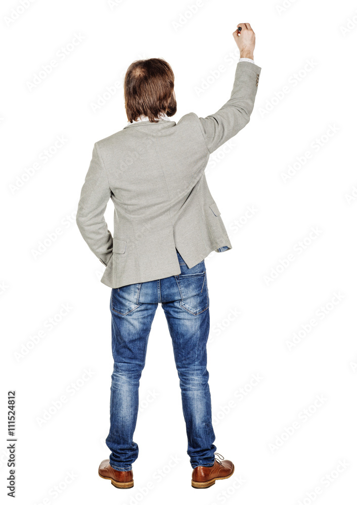 Rear or back view full body picture of man writing something on Rear or back view full body picture of man writing something on
