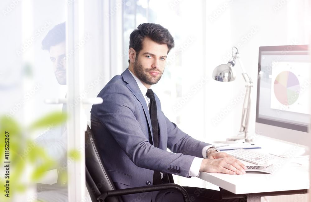 Young businessman working at bank Young businessman working at bank