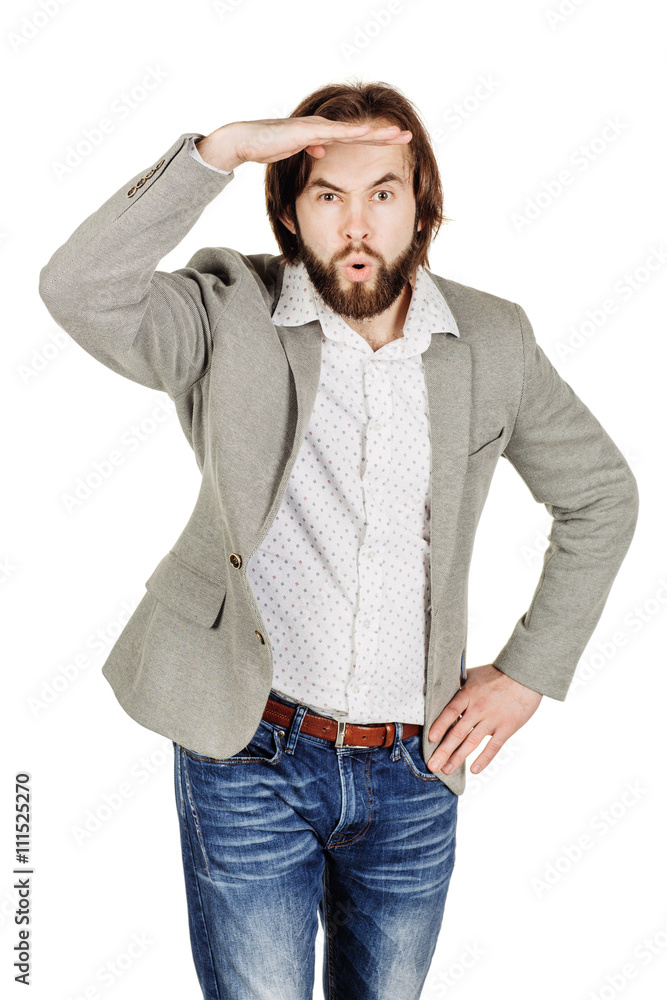 businessman ooking away while keeping his hand over his eyes to businessman ooking away while keeping his hand over his eyes to