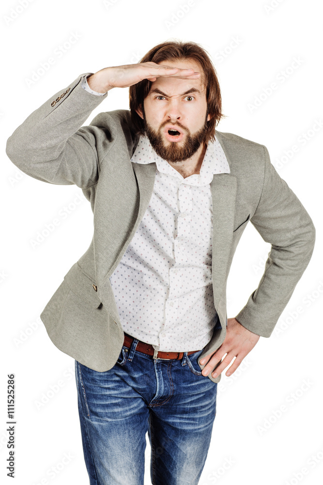 businessman ooking away while keeping his hand over his eyes to businessman ooking away while keeping his hand over his eyes to