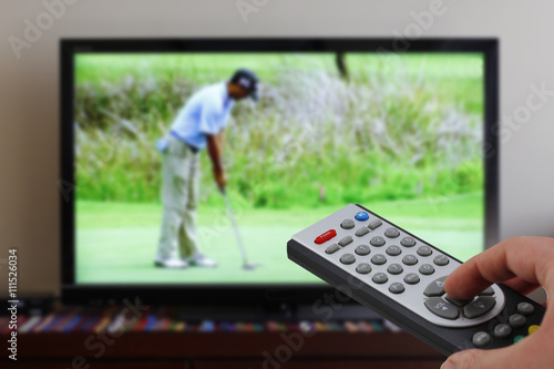 Zapping tv during golf