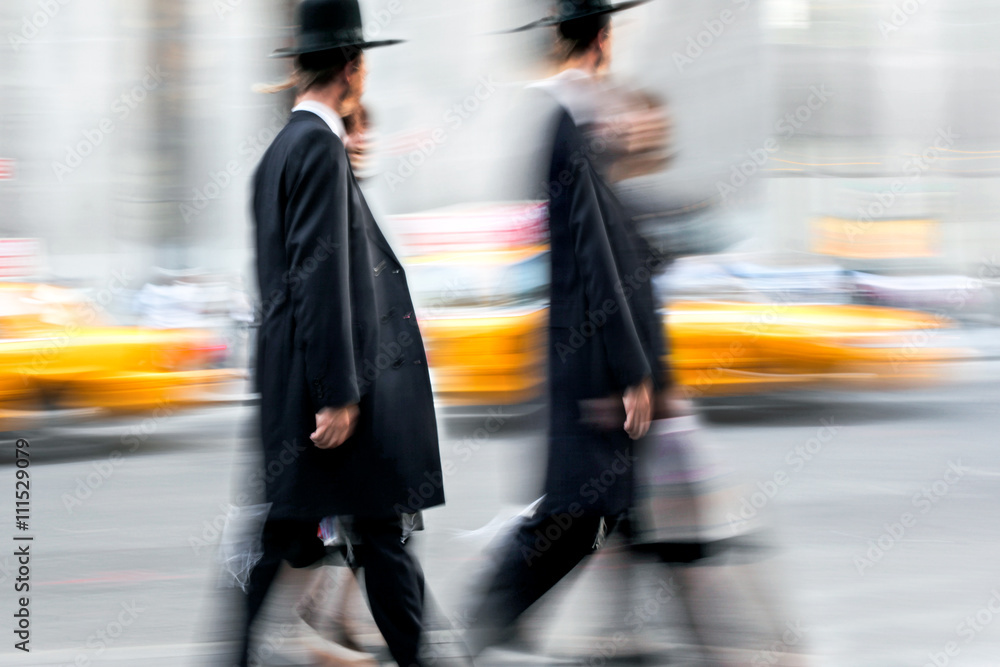 motion blurred business people walking on the street motion blurred business people walking on the street
