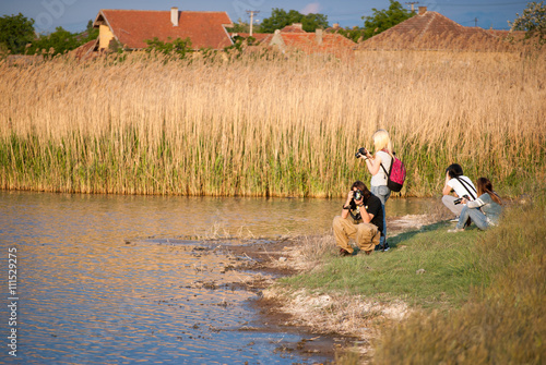 Little Rusanda pond near Melenci in Serbia during sunny day and sunset photo