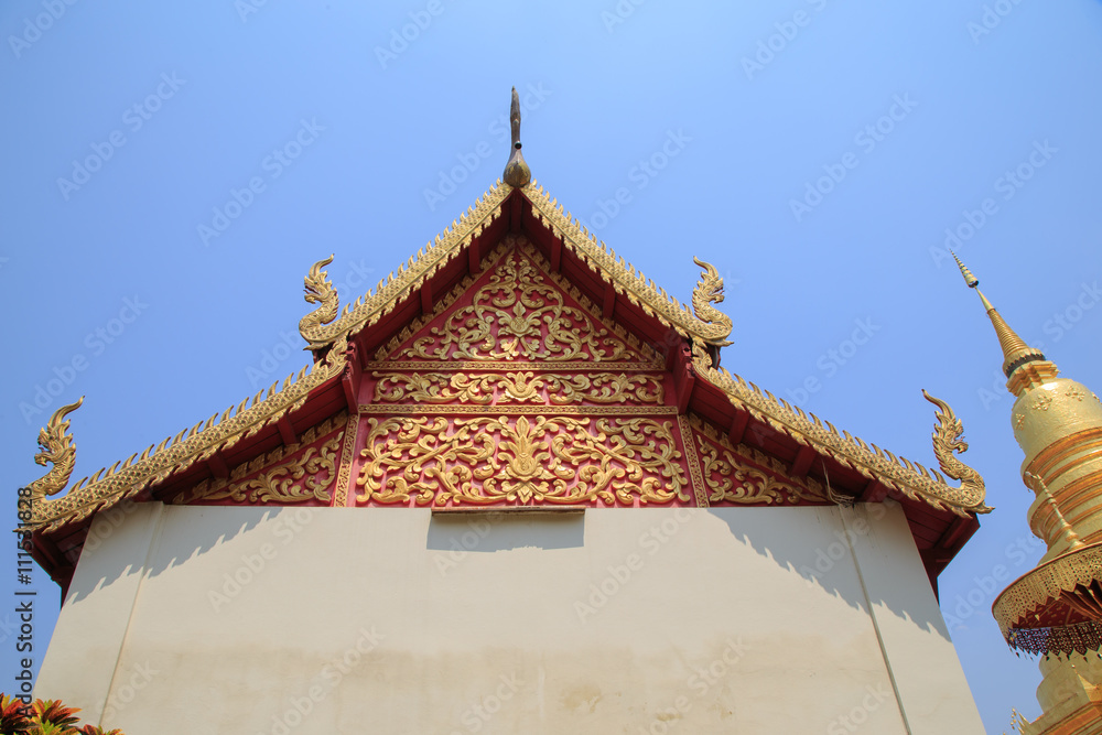 the art design of sculpture on buddhism temple gable

