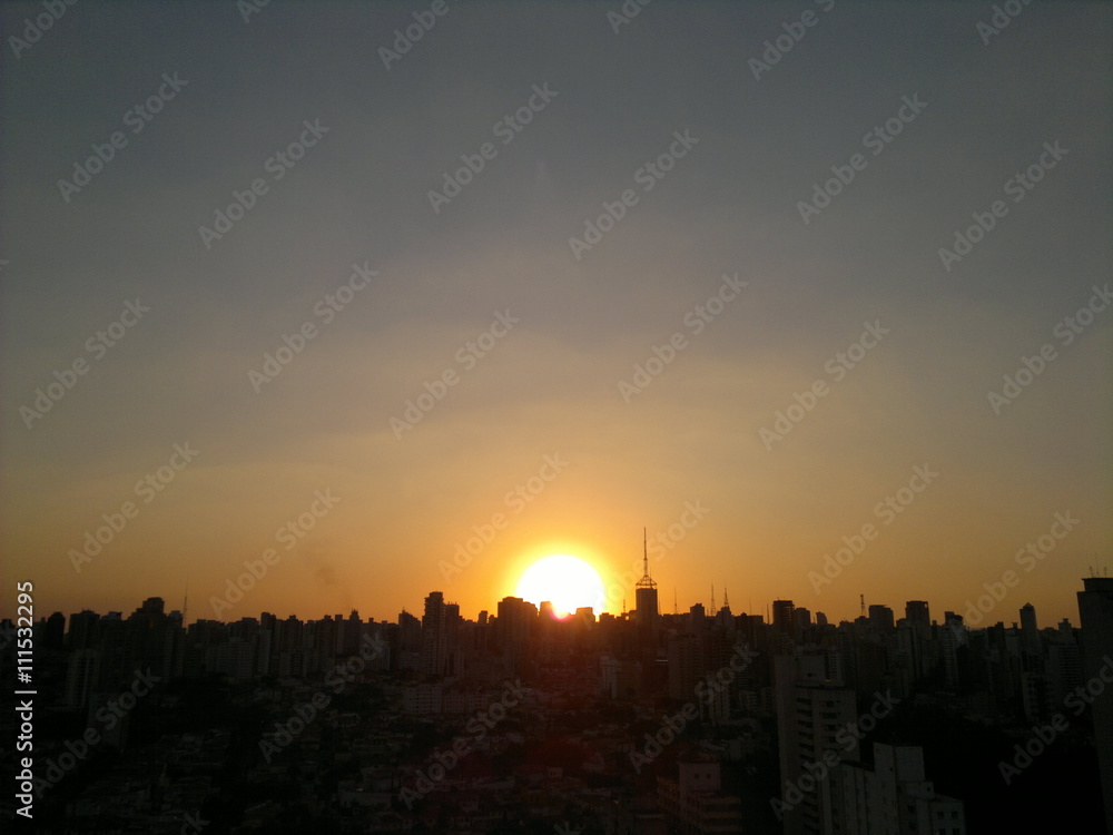 Fototapeta premium Sky over the city at sunset