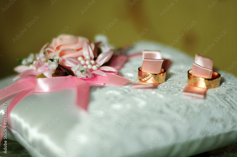 square white pillow with wedding rings square white pillow with wedding rings