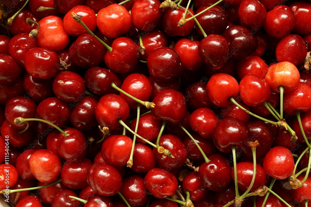Close-up photo of fresh cherries. Close-up photo of fresh cherries.