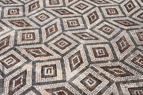 Geometric mosaic, Roman ruins of the ancient city of Conimbriga, Beiras region, Portugal photo