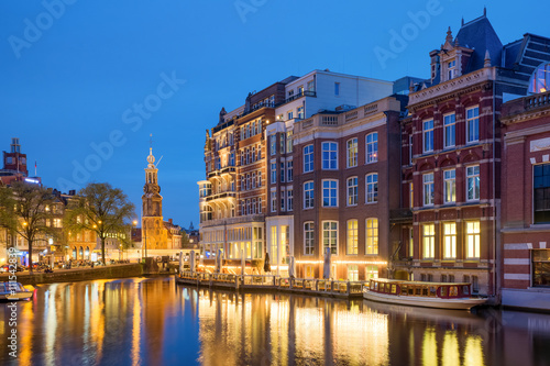 Amsterdam clock tower is one of attractions near the flower mark © ake1150