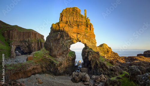 Fotografie, Obraz Carsaig Arches - rocks formation in sunset light, Isle of Mull, Scotland