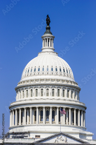 US Capitol dome with US flag