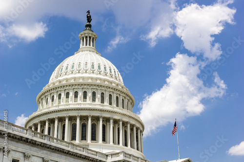 US Capitol dome with US flag