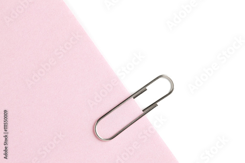 silver paperclip with pink adhesive note