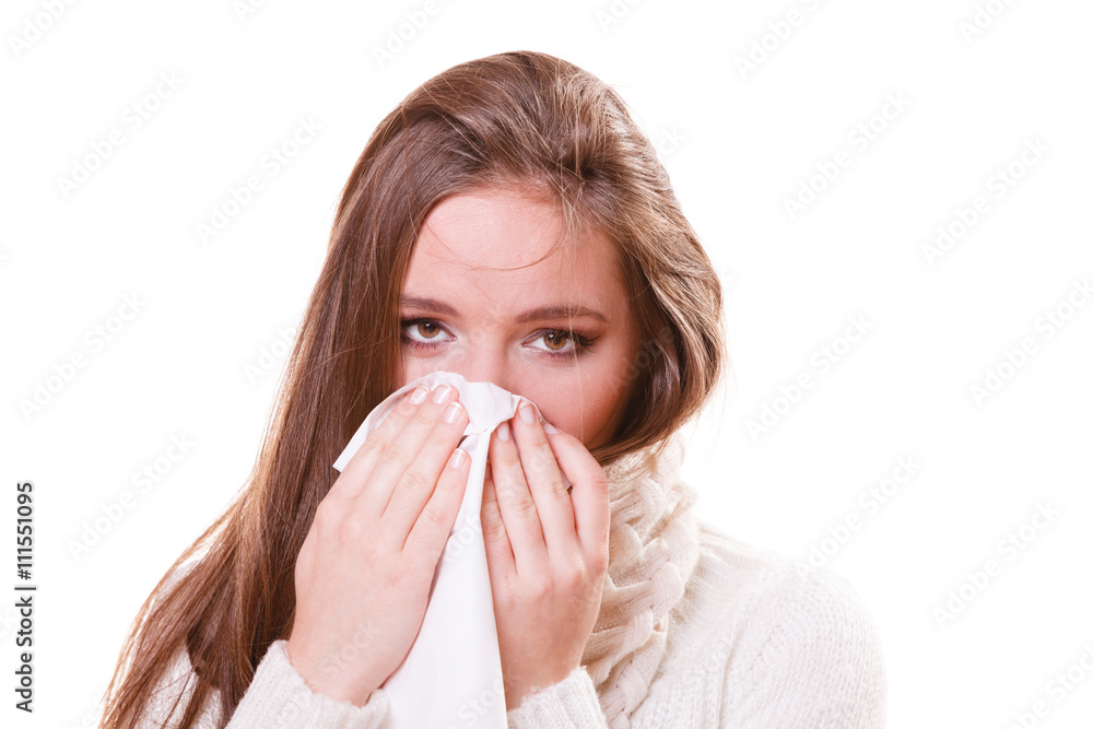 Sick woman girl with fever sneezing in tissue Sick woman girl with fever sneezing in tissue