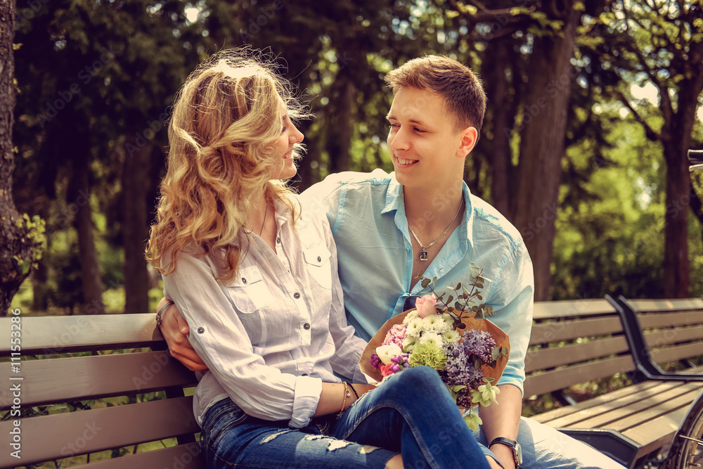 Naklejka premium Loving adult couple in summer park.