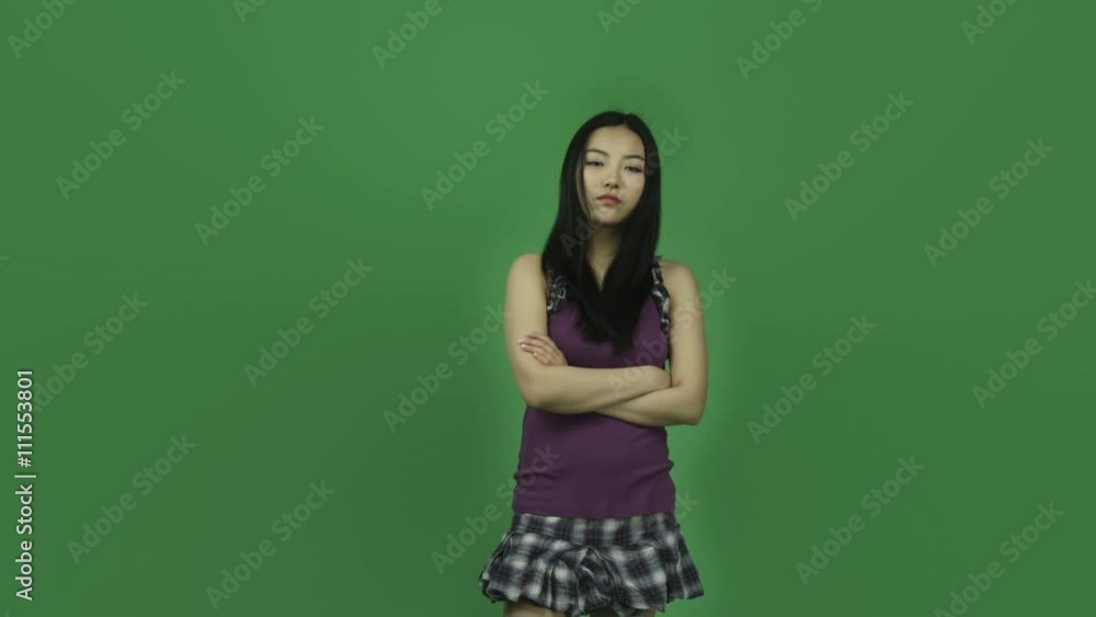 Asian student girl isolated greenscreen green background upset worried Asian student girl isolated greenscreen green background upset worried