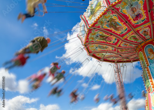 kettenkarussell karussell Oktoberfest,wiesn,fahrgeschäft,bewegungsunschärfe unschärfe photo