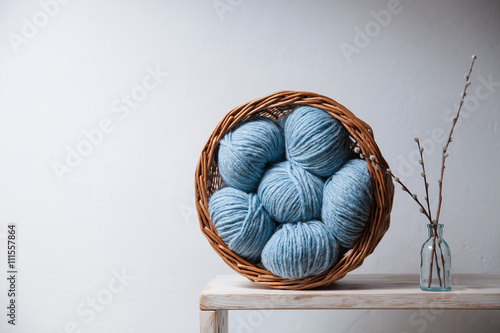 Closeup of basket with colorful yarn clews